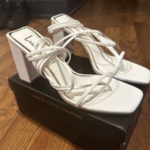 Lulu’s White Strapping Sandel